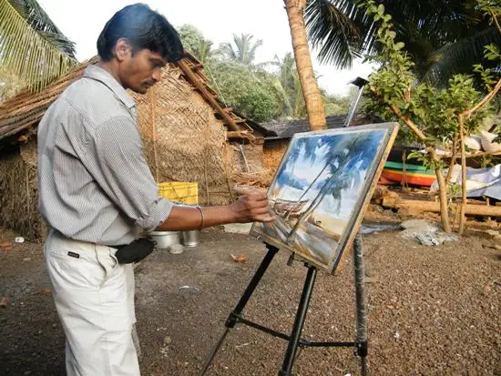 Shri. Sandeep Yadav doing painting at beach at Shreevardhan