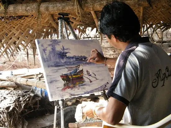 Shri. Sandeep Yadav doing painting at beach at Shreevardhan