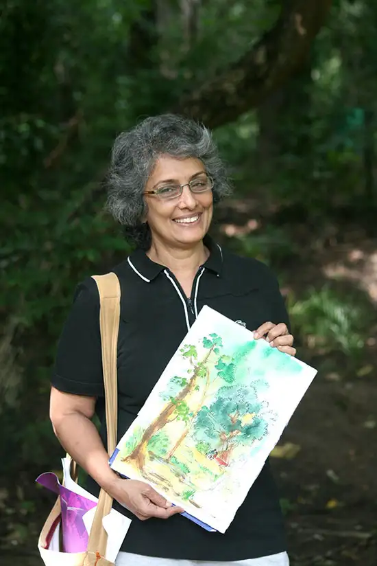 Lady rider showing her completed painting