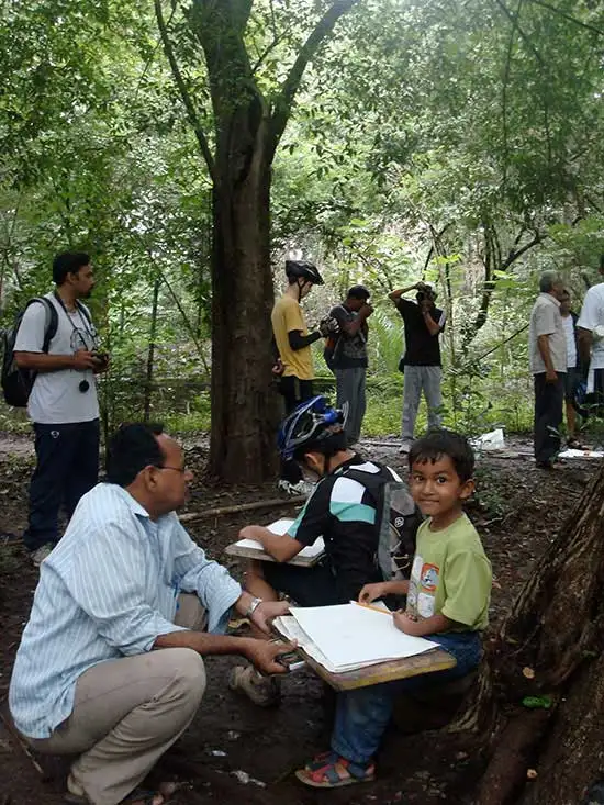 Small kid enjoying drawing