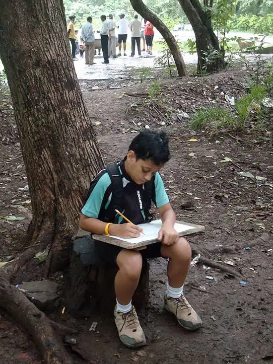 Child doing painting at Pune university campus