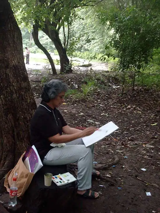 Lady rider doing painting at Pune university campus