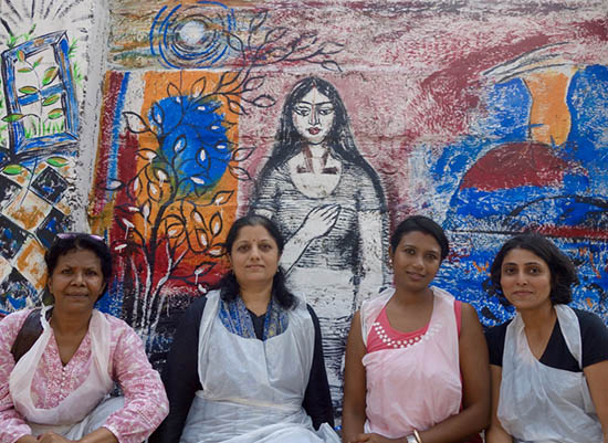artists painting a wall at Mumbai for Art India Foundation