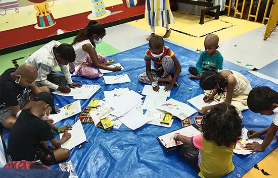 Kids paint butterflies at the art workshop at TMC, Mumbai