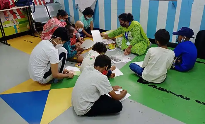 Children paints flower vase at art workshop at TMC, Mumbai on 2 June 2022