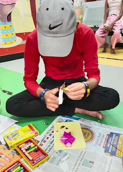 Boy making greeting card