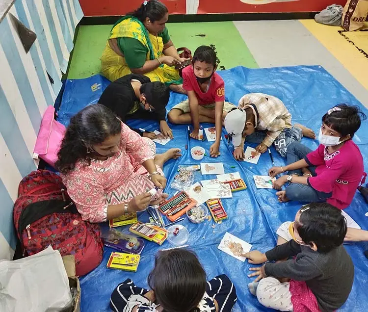 Children create art objects from waste of pencil sharpening at TMC, Mumbai