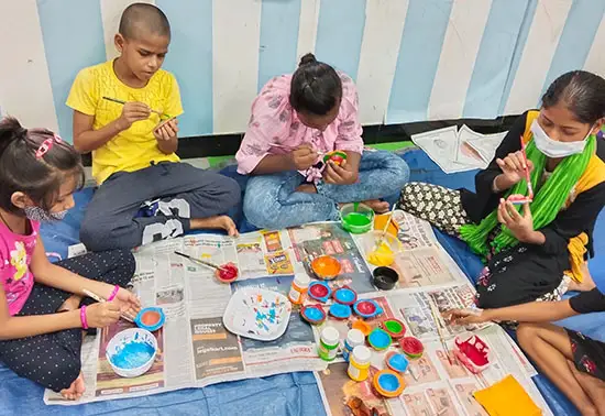 Children's painting workshop of earthen lamps and greeting cards at TMC, Mumbai