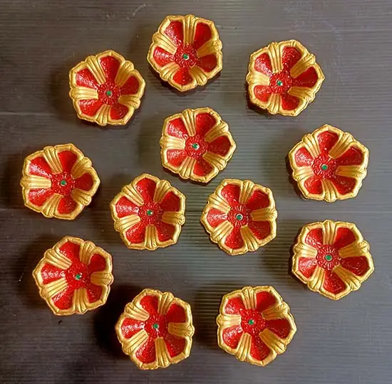 Diyas painted by kids at workshop at TMC, Mumbai