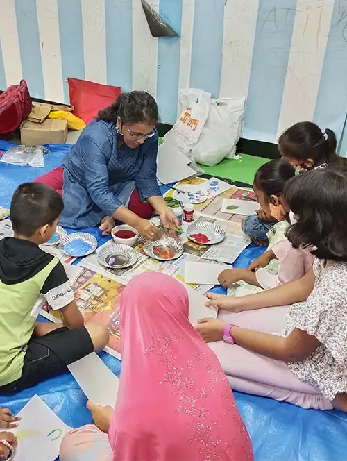 Children make leaf print greeting cards for Diwali at TMC, Mumbai