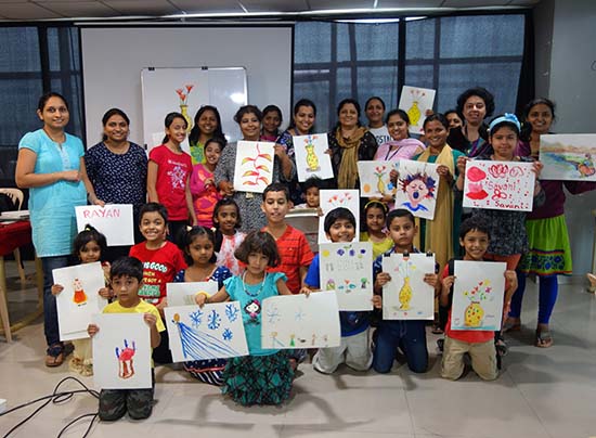Chidren with their paiting at art workshop at Pune