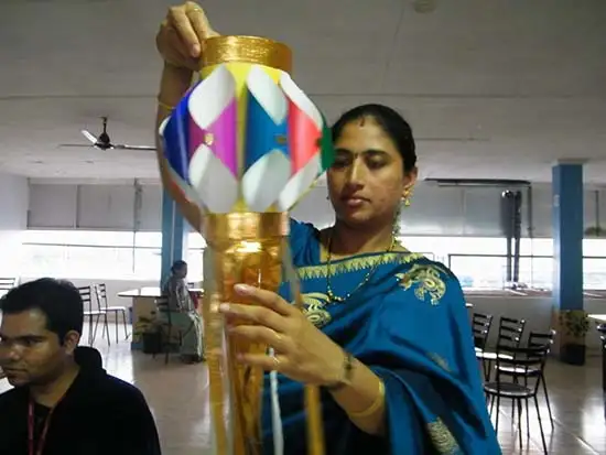 Showing of ready latern by lady participant