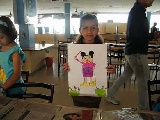 Cartoon drawing by girl at diwali workshop