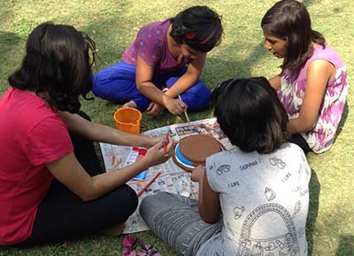 Kids celebrate Holi painting earthen pots - 3