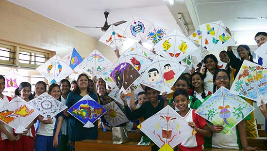 Art educator Chitra Vaidya with students from Madhavrao Bhagwat High School, Mumbai at Kite painting workshop