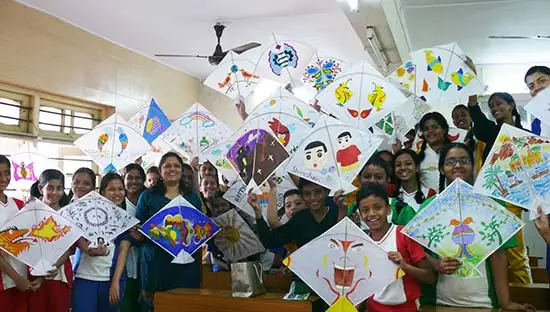Art educator Chitra Vaidya with students from Madhavrao Bhagwat High School, Mumbai at Kite painting workshop