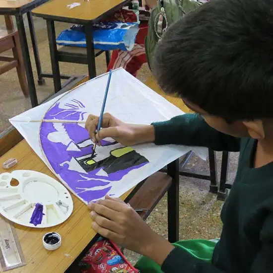 Boy at Kite Painting Workshop