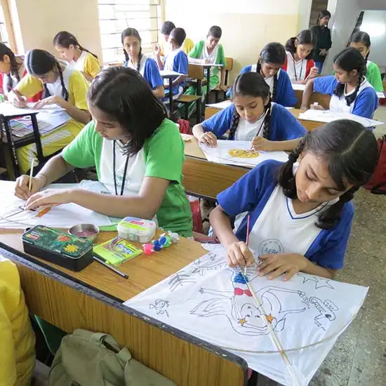 Girls paint the kite