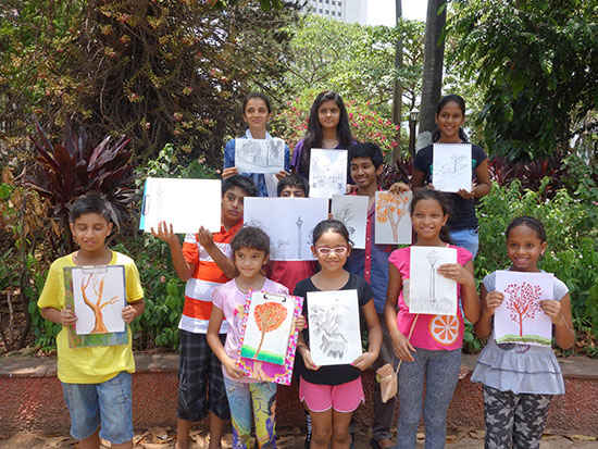 Participants of all age groups with their painting