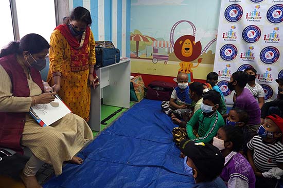 Artist Chitra Vaidya conducting art workshop for children undergoing treatment for cancer at Tata Memorial Centre, Mumbai