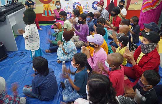 Children enjoying music workshop by Khula Aasmaan at Tata Memorial Centre 