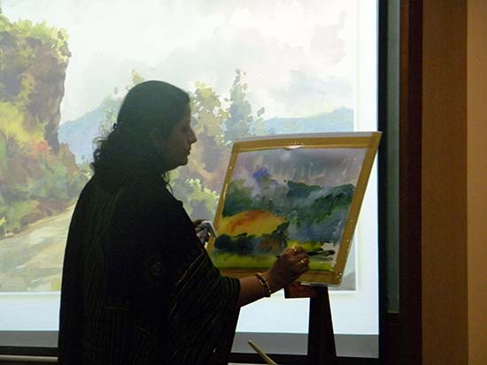 artist Chitra Vaidya demonstrating watercolour painting for the students of Jnana Prabodhini Prashala, Pune 